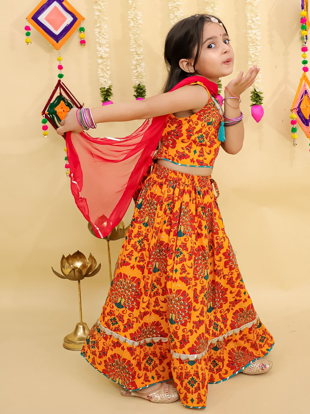 Girl's traditional yellow lehenga choli with dupatta