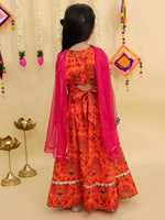 Girl's traditional orange lehenga choli with dupatta