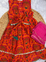 Girl's traditional orange lehenga choli with dupatta