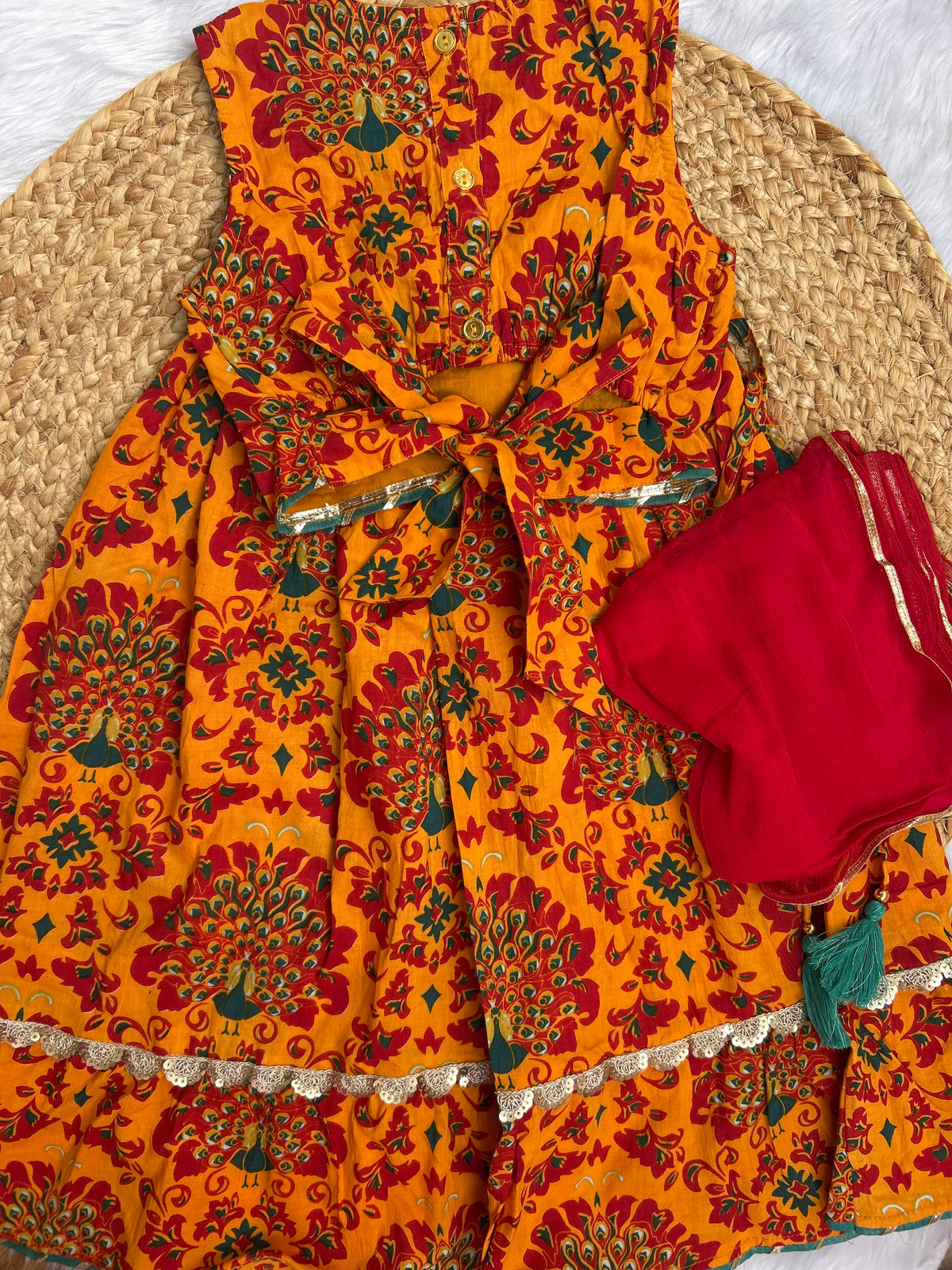 Girl's traditional yellow lehenga choli with dupatta