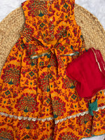 Girl's traditional yellow lehenga choli with dupatta